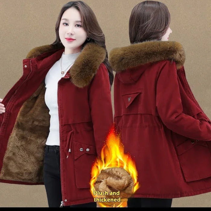 Woman wearing a red plush-lined winter coat with fur collar, shown front and back, highlighting thick warmth