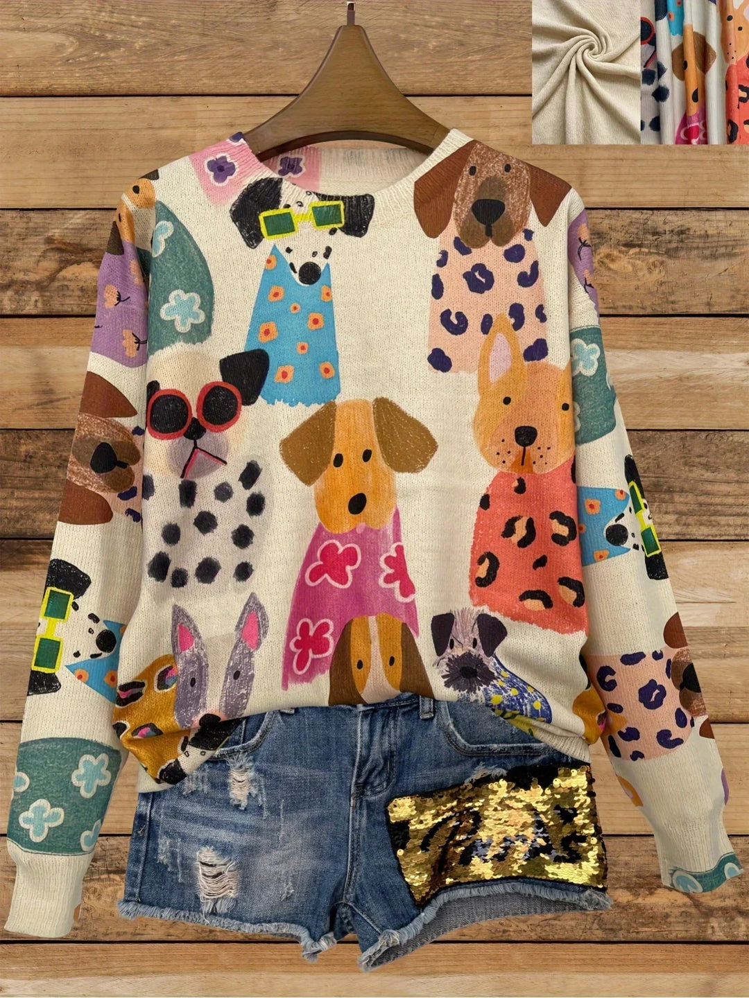 Colorful dog print sweater paired with distressed denim shorts featuring a gold sequin patch