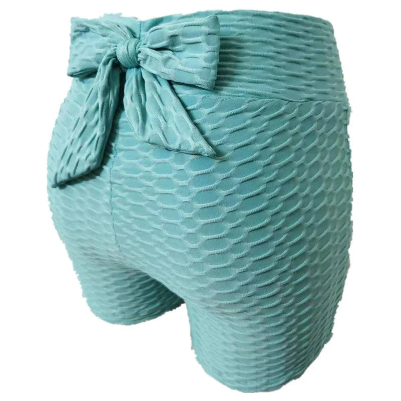 Textured aqua high-waisted shorts with a back bow, honeycomb pattern