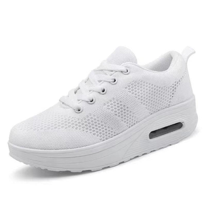 white breathable mesh athletic sneaker with cushioned sole and air pocket for comfort