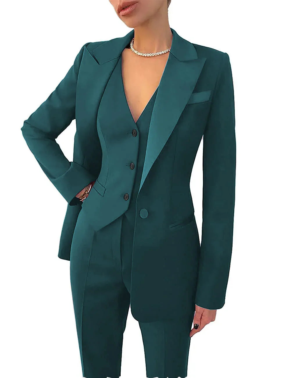 Woman wearing teal tailored pantsuit with fitted blazer, vest, and trousers, accessorized with a pearl necklace