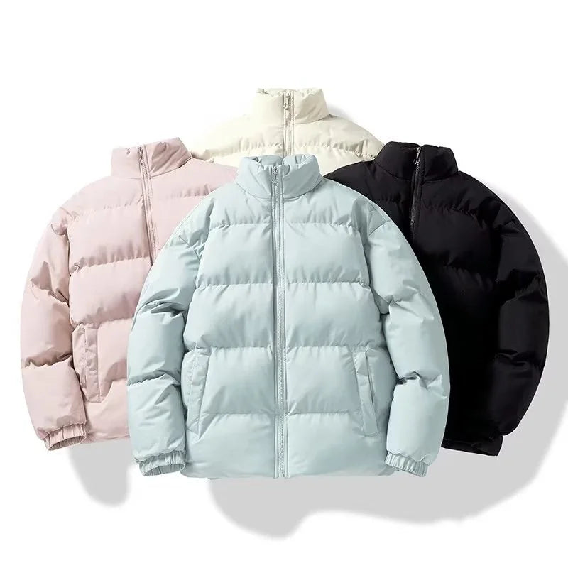 Set of four puffer jackets in pastel pink, light blue, cream, and black with stand collars and front zippers