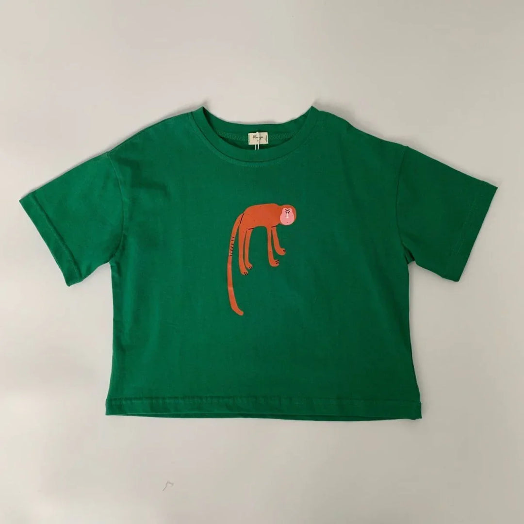 Green short-sleeve t-shirt with a minimalist orange monkey graphic on front