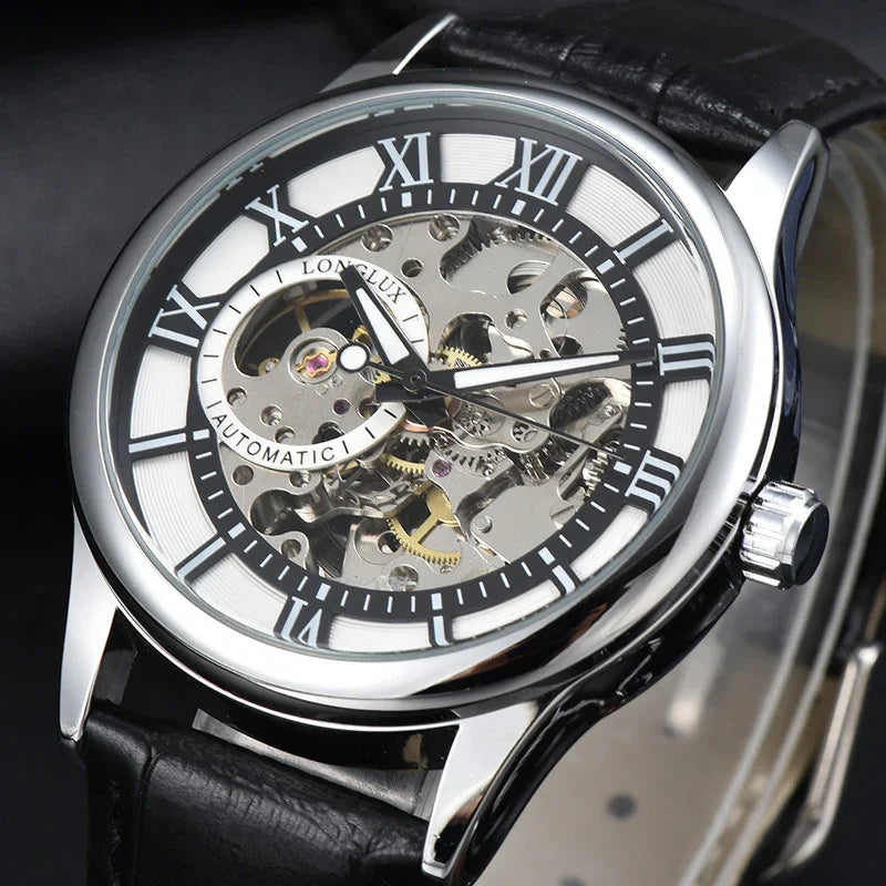 Close-up of a Longlux automatic skeleton watch with silver case, black Roman numerals, and black leather strap