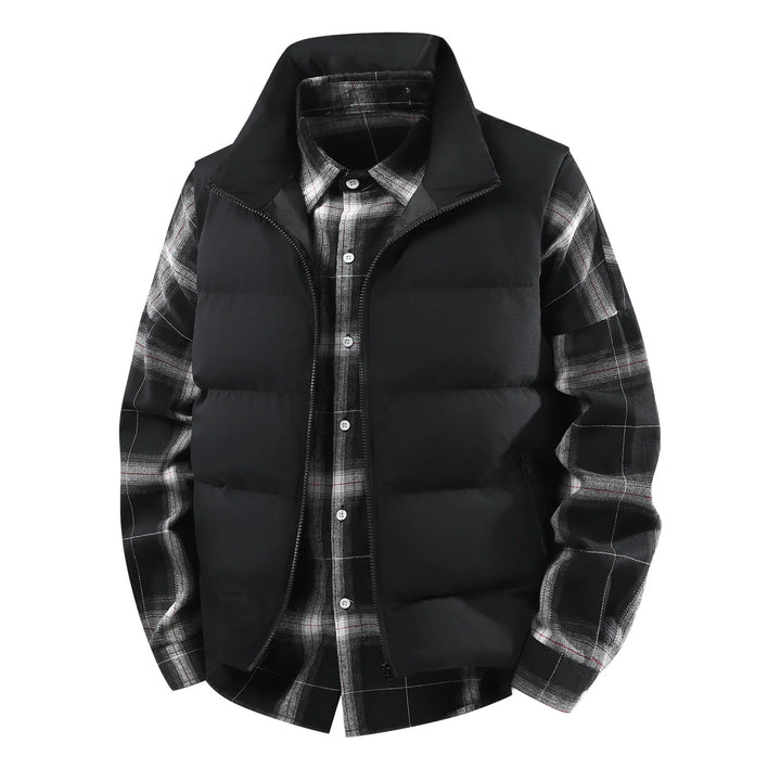 Black padded vest layered over black and white plaid button-up shirt