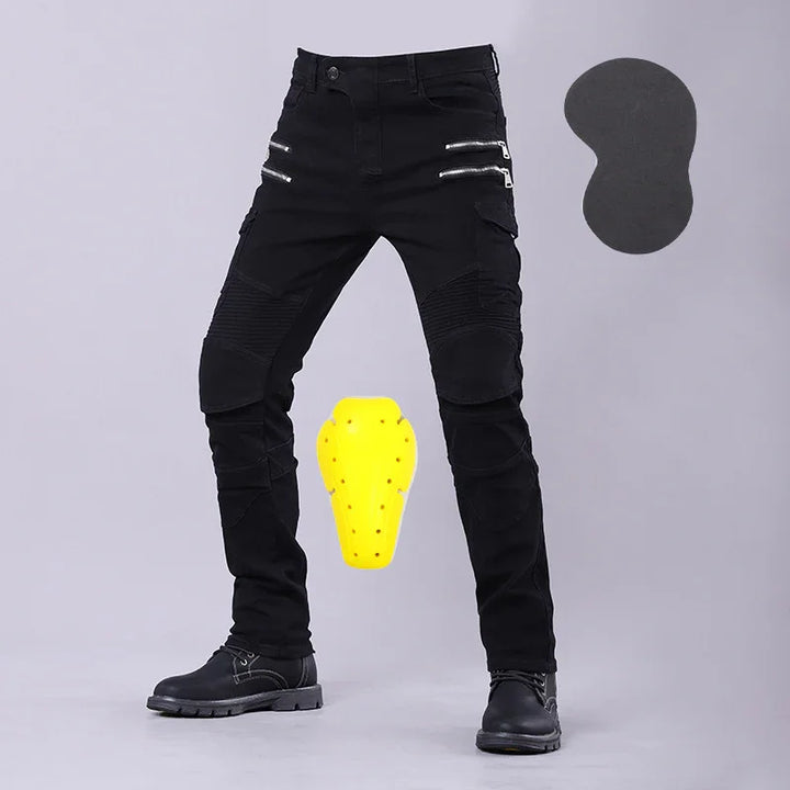 Black motorcycle pants with knee padding and yellow protective armor insert on grey background