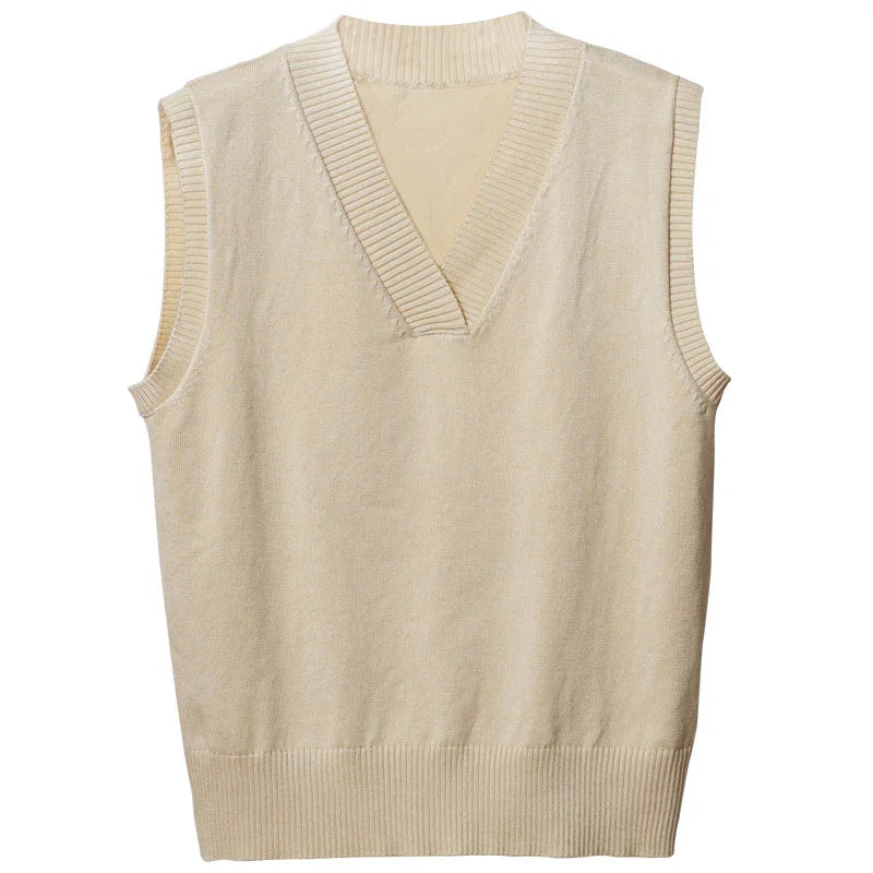 Beige sleeveless knit sweater vest with ribbed V-neck, armholes, and hem