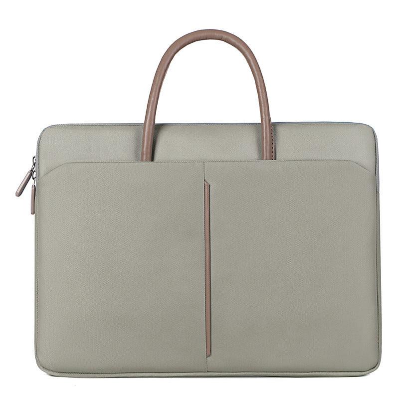 Minimalist gray laptop bag with brown handles and front pockets, modern business briefcase