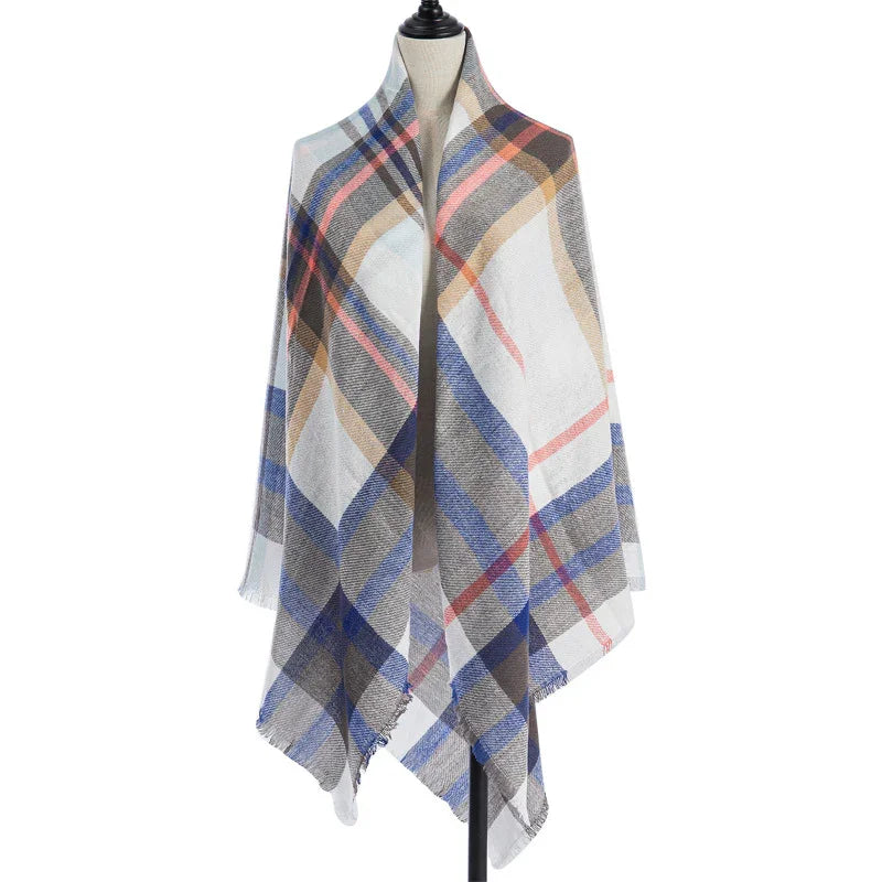 Soft lightweight plaid scarf with blue, beige, pink, and gray stripes displayed on mannequin