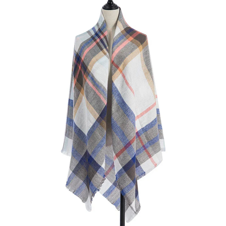 Soft lightweight plaid scarf with blue, beige, pink, and gray stripes displayed on mannequin