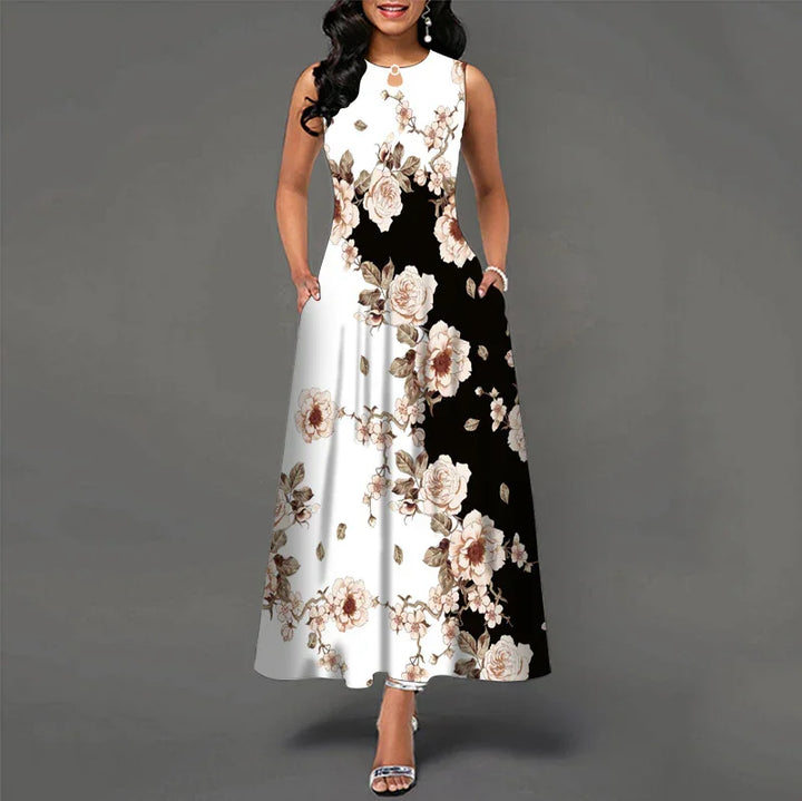 Elegant sleeveless long dress with black and white floral pattern and keyhole neckline