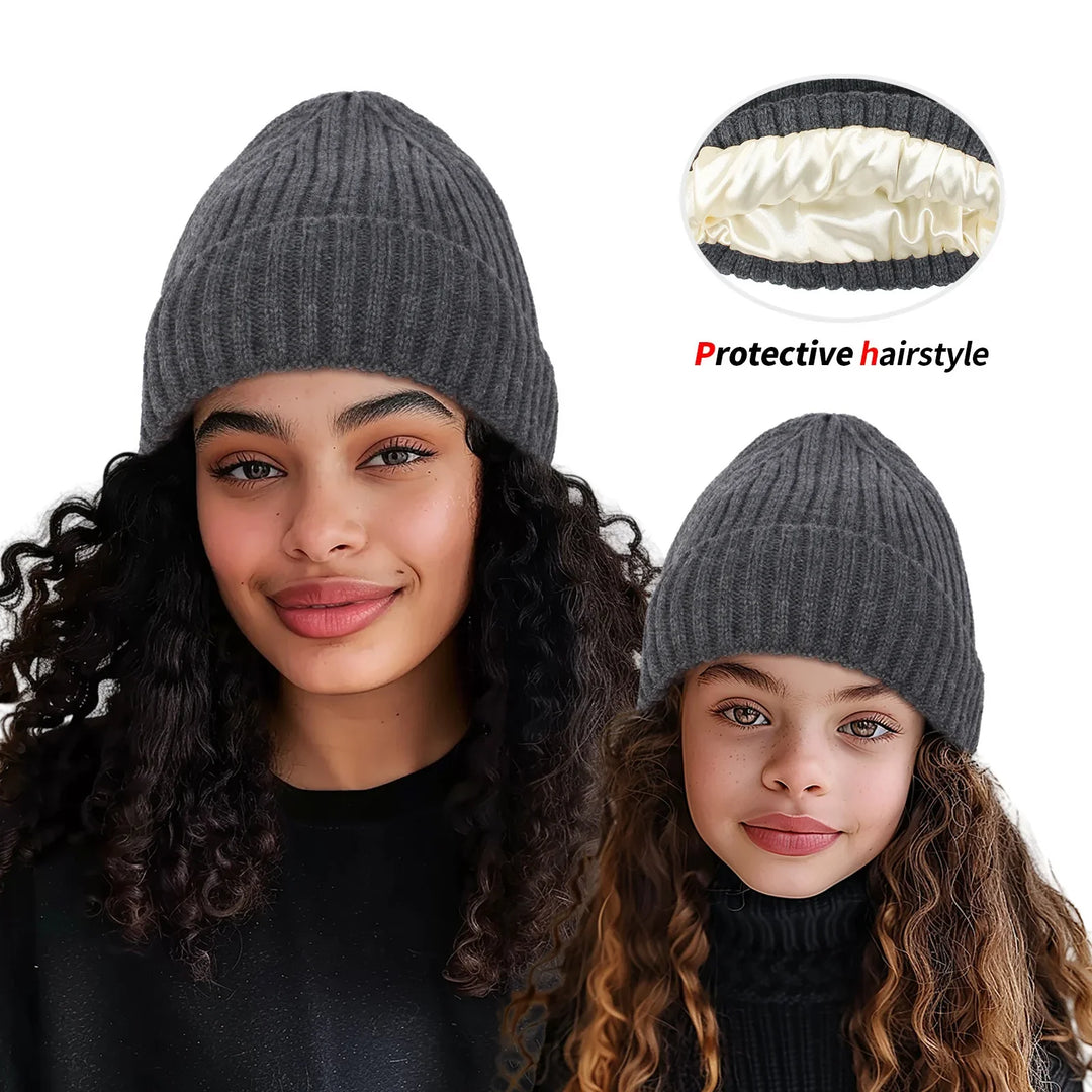 Women and girl wearing soft gray knit beanies with satin-lined interior for protective hairstyle