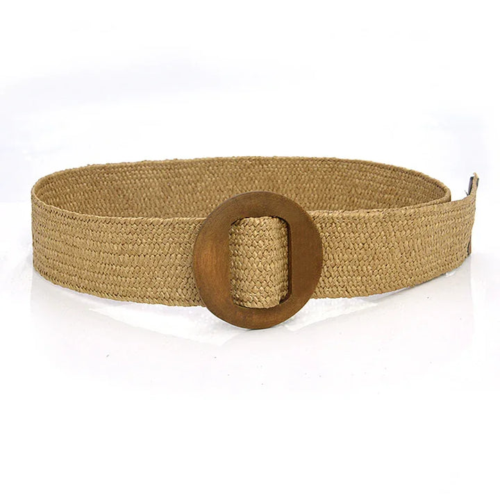 Natural woven straw belt with large round wooden buckle on white background