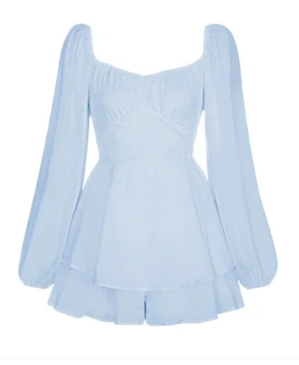 Light blue long sleeve romper with square neckline and flowing shorts