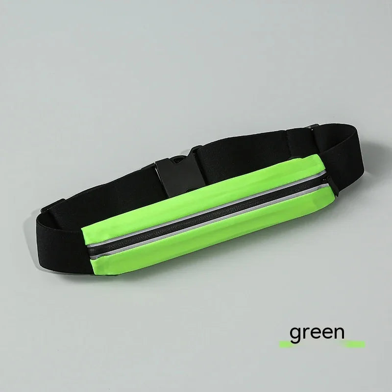 Neon green running waist belt with black adjustable strap and zipper, laid on grey background