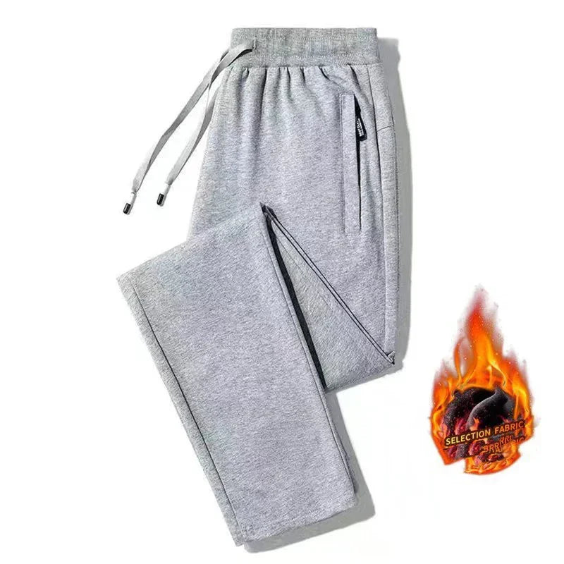 Grey fleece sweatpants with drawstring waist and zippered pocket, warm winter fabric