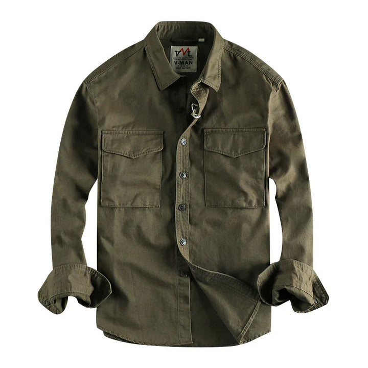 Men's olive green button-up shirt with two chest pockets and rolled cuffs on white background