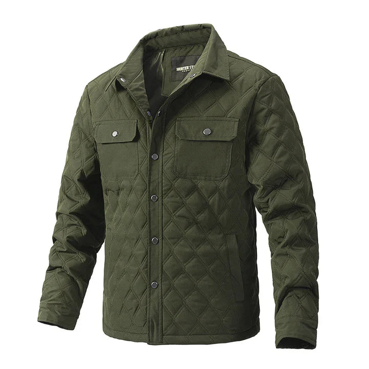 Olive green quilted jacket with button front, chest pockets, and long sleeves