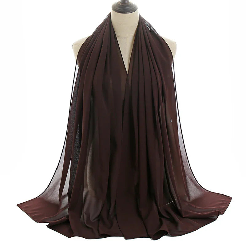Dark brown lightweight chiffon scarf draped on dress form with soft folds