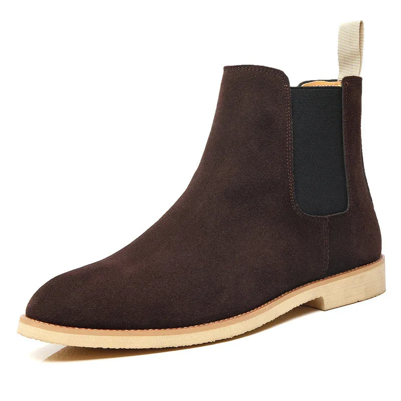 Brown suede Chelsea boot with beige sole and pull tab, black elastic side panel