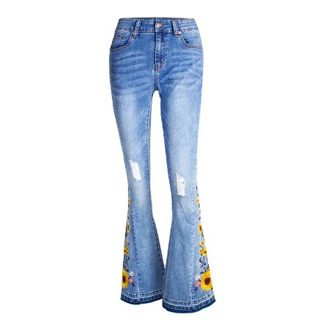 Blue high-waisted flare jeans with distressed patches and colorful floral embroidery on legs