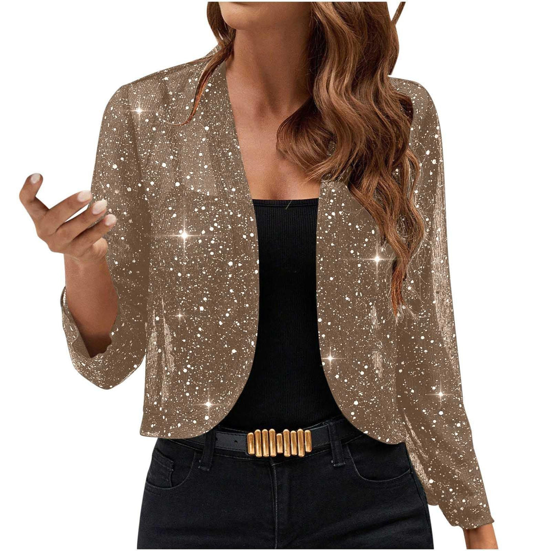 Women's brown sparkling glitter blazer styled with black top and jeans, featuring gold belt buckle