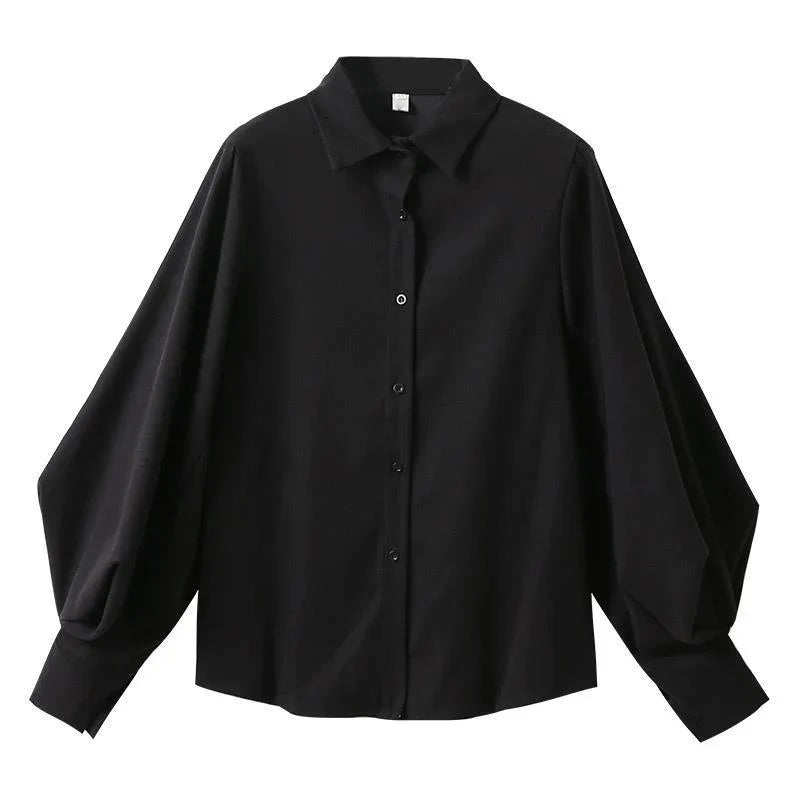 Black long-sleeve button-up shirt with puffed sleeves and classic collar