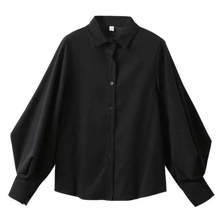 Black long-sleeve button-up shirt with puffed sleeves and classic collar