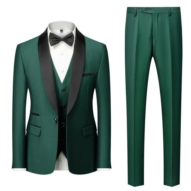 Emerald green men's three-piece tuxedo with black satin lapel, white shirt, black bow tie, and matching dress pants