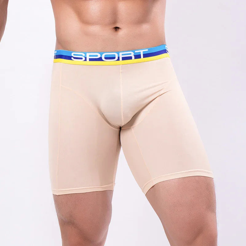 Men's beige sports compression shorts with blue and yellow waistband labeled SPORT