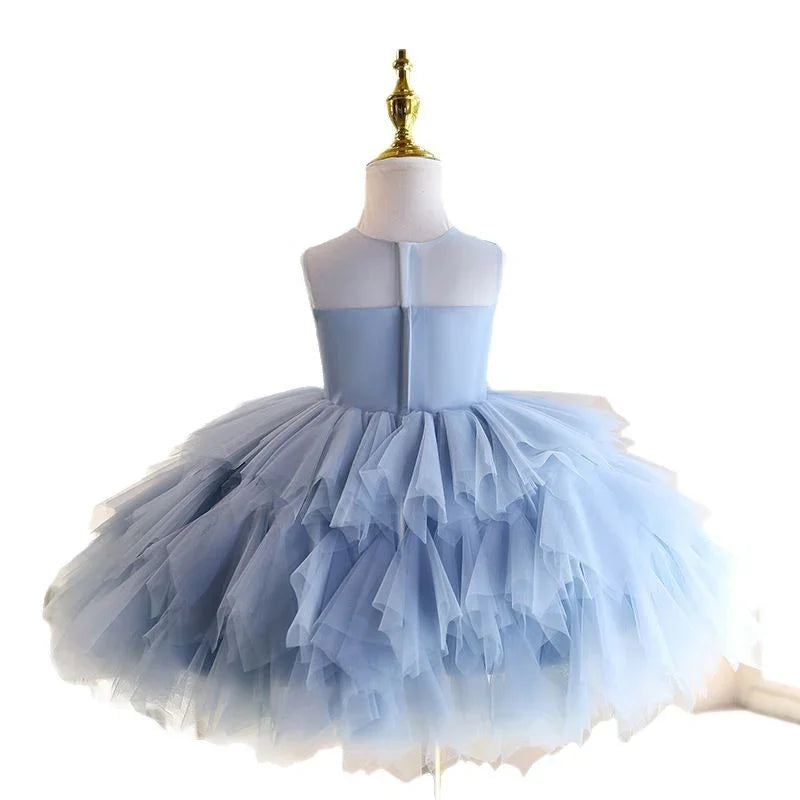 Light blue sleeveless tutu dress with layered tulle skirt on a dress form