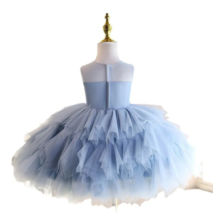 Light blue sleeveless tutu dress with layered tulle skirt on a dress form