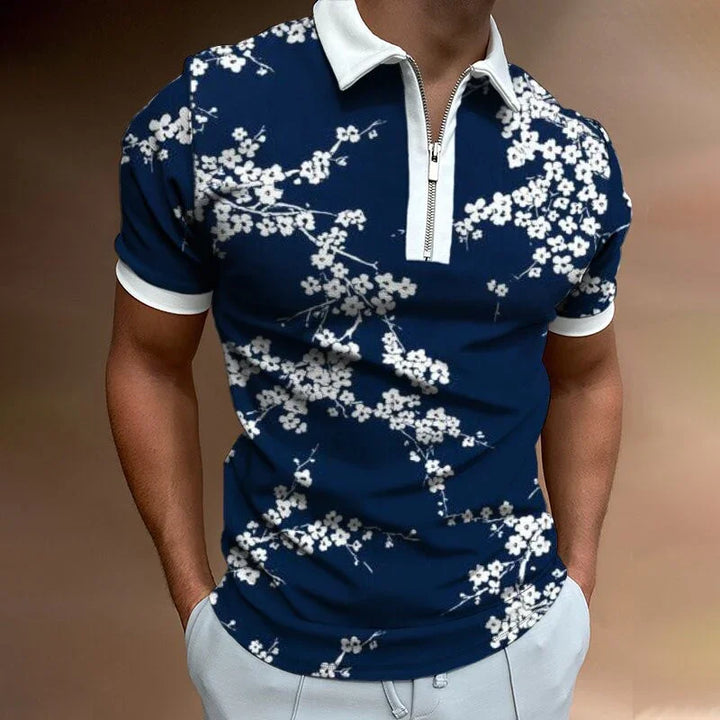 Men's navy blue polo shirt with white floral print and white collar zipper detail
