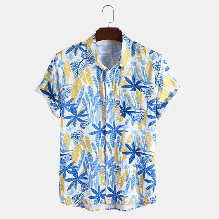 Men's short sleeve button-up shirt with blue and yellow tropical leaf pattern on white background