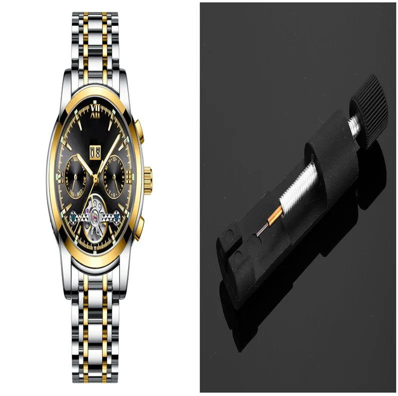 Luxury gold and silver wristwatch with black dial and tourbillon next to black watch spring tool