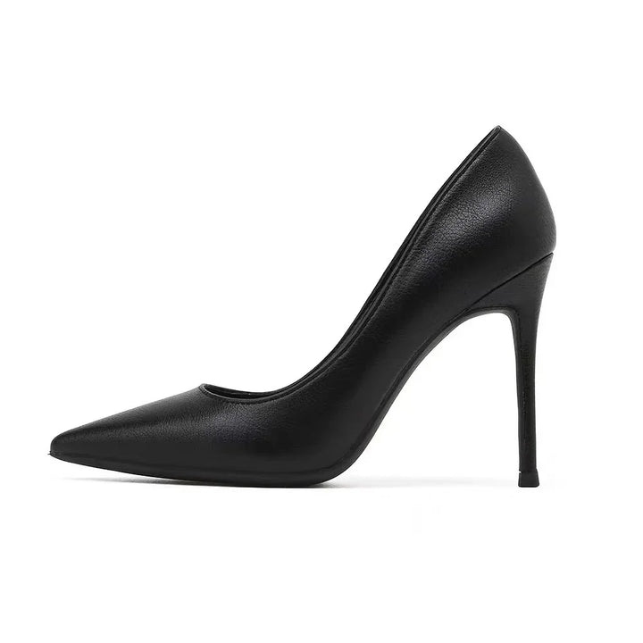 Black pointed-toe high heel stiletto shoe with leather texture on white background