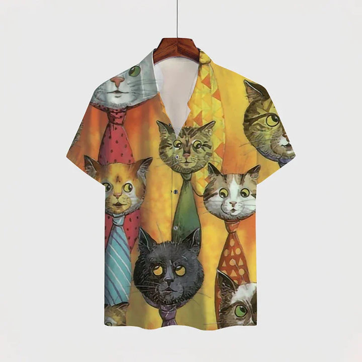 Short-sleeve button-up shirt with colorful cat faces wearing ties on an orange and yellow background