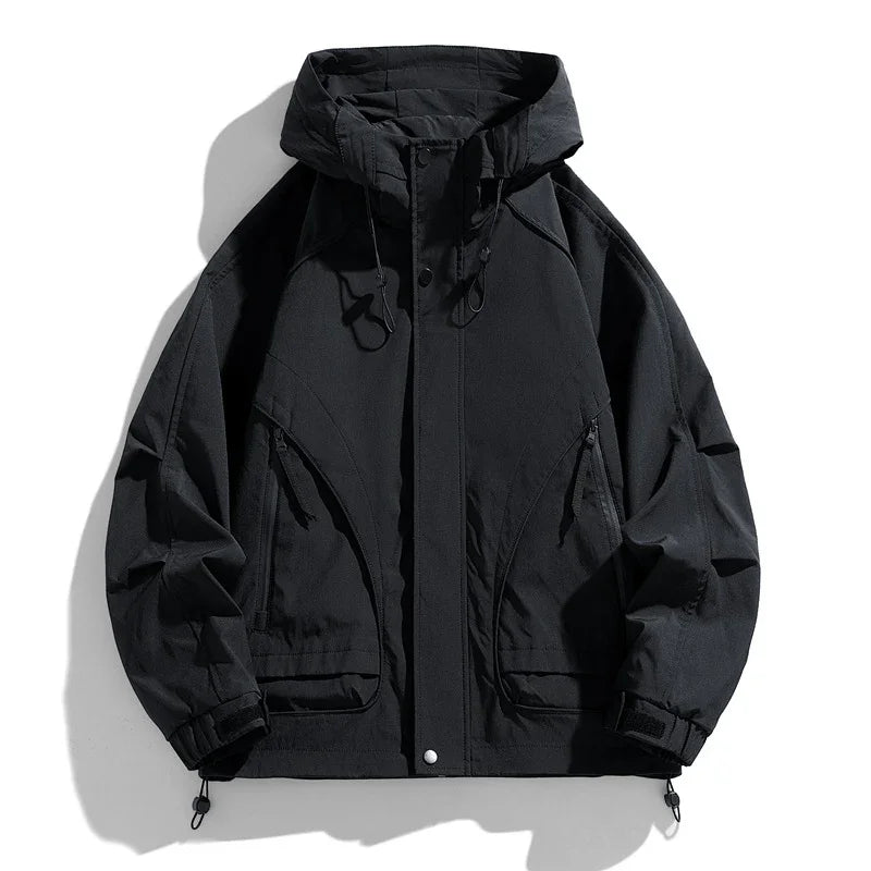 black hooded windbreaker jacket with front zipper, drawstring hood, and multiple pockets