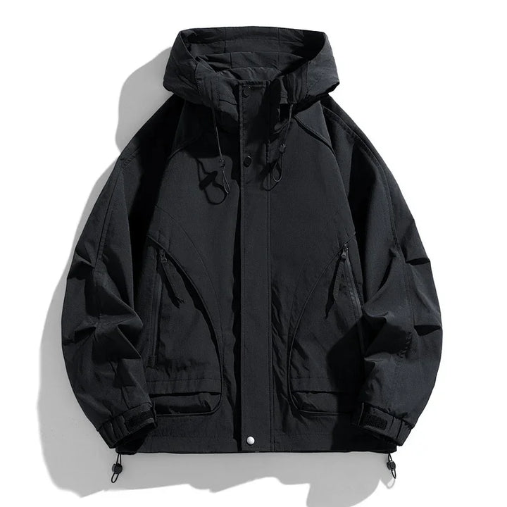 black hooded windbreaker jacket with front zipper, drawstring hood, and multiple pockets