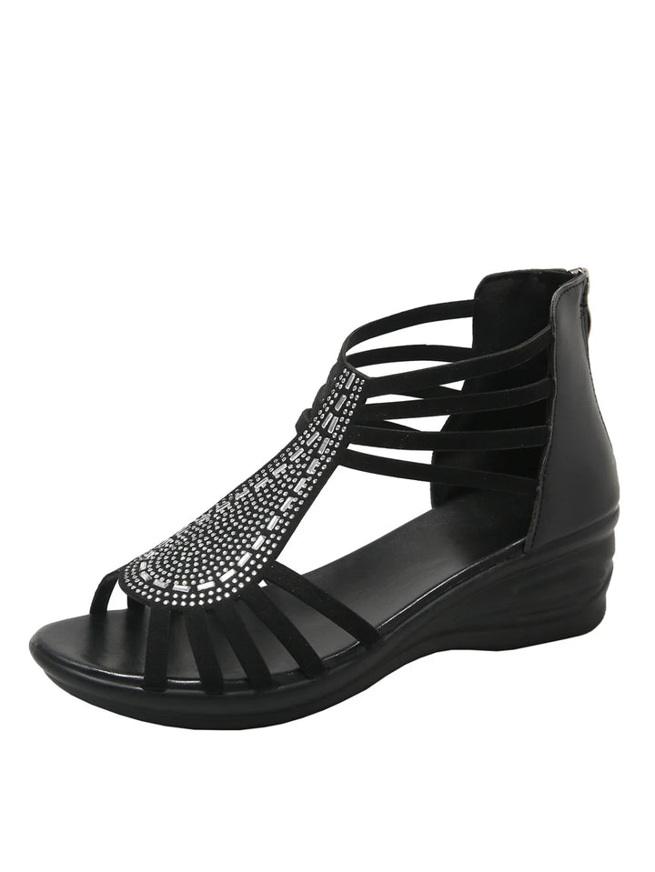 Black women's wedge sandal with rhinestone embellishments and multiple straps