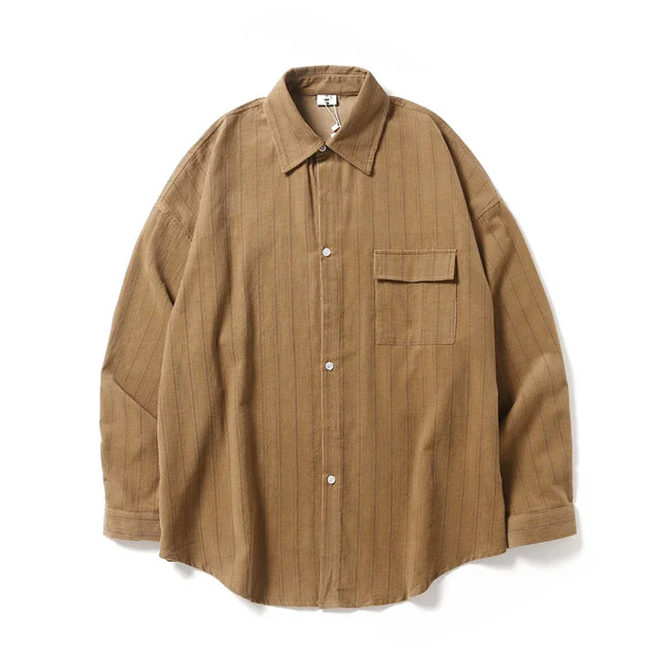 Brown long-sleeve button-up shirt with pointed collar and chest pocket on white background