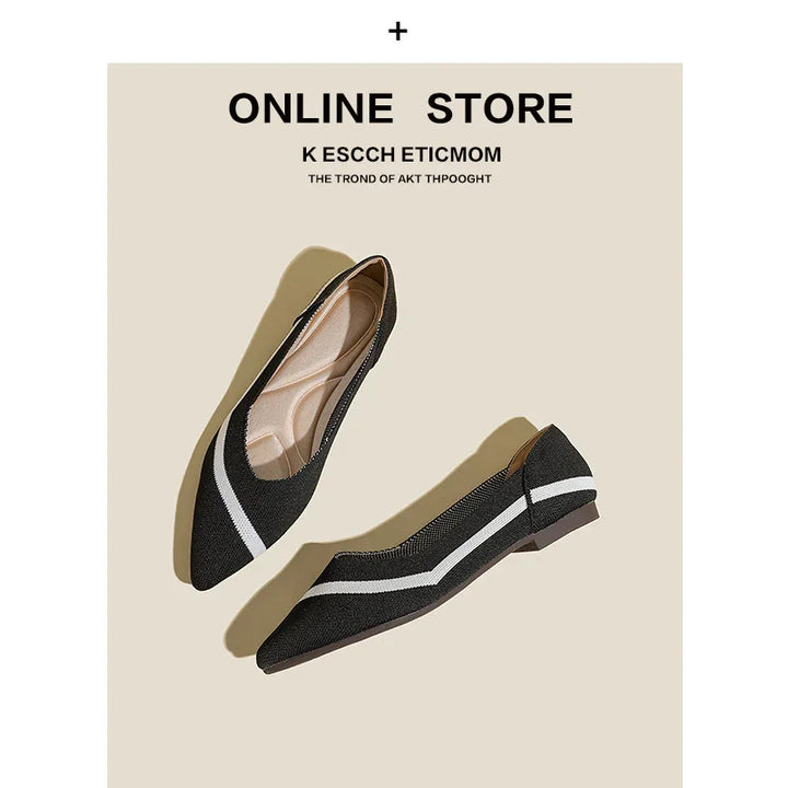 Black and white striped women's pointed flats on beige background with online store text