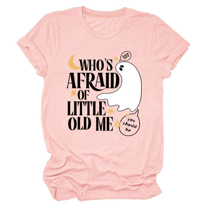 Pink t-shirt with Halloween ghost graphic and text Who's afraid of little old me
