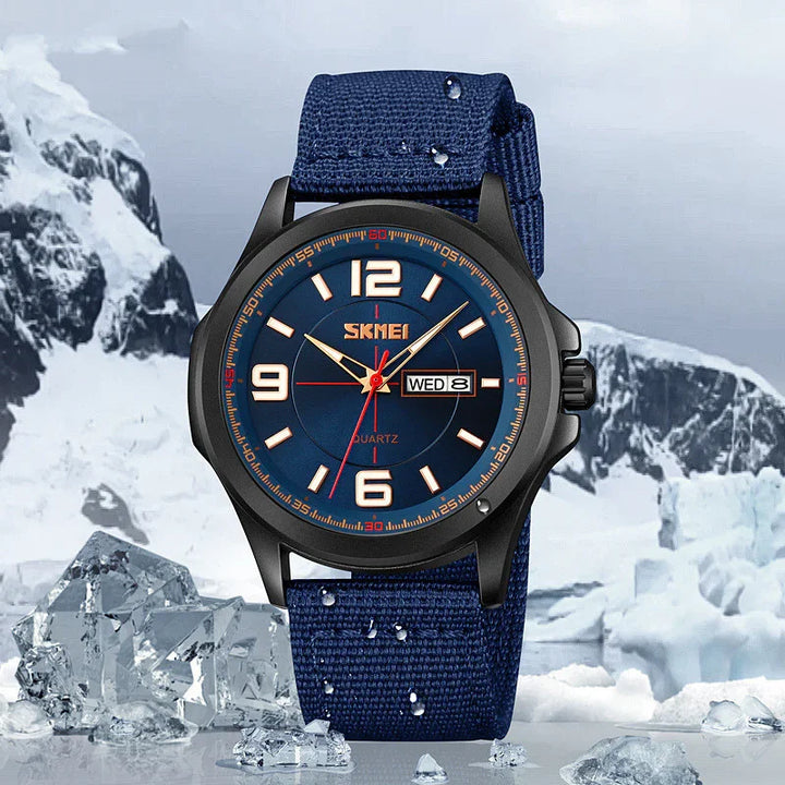 Blue SKMEI quartz wristwatch with date display and fabric strap on icy mountain background