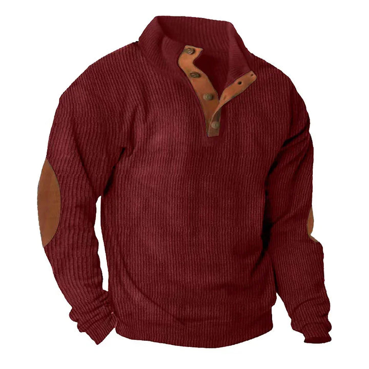 Men's burgundy knit pullover sweater with brown elbow patches and buttoned collar
