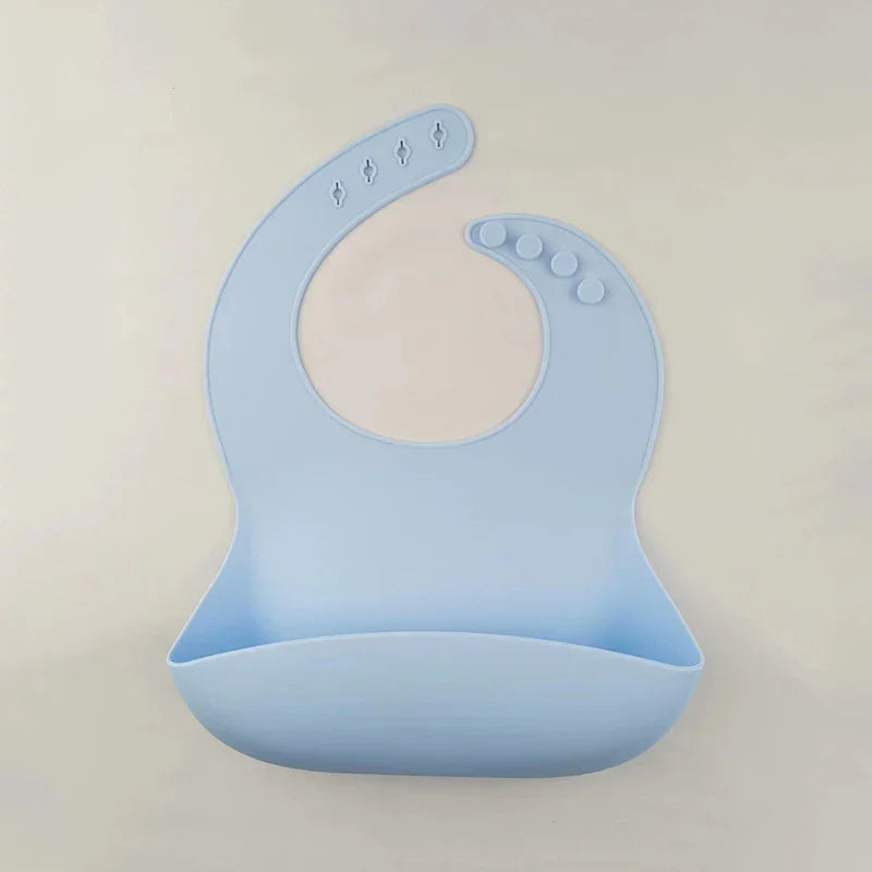 Light blue silicone baby bib with adjustable snap buttons and food catch pocket