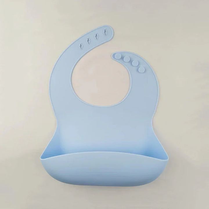 Light blue silicone baby bib with adjustable snap buttons and food catch pocket