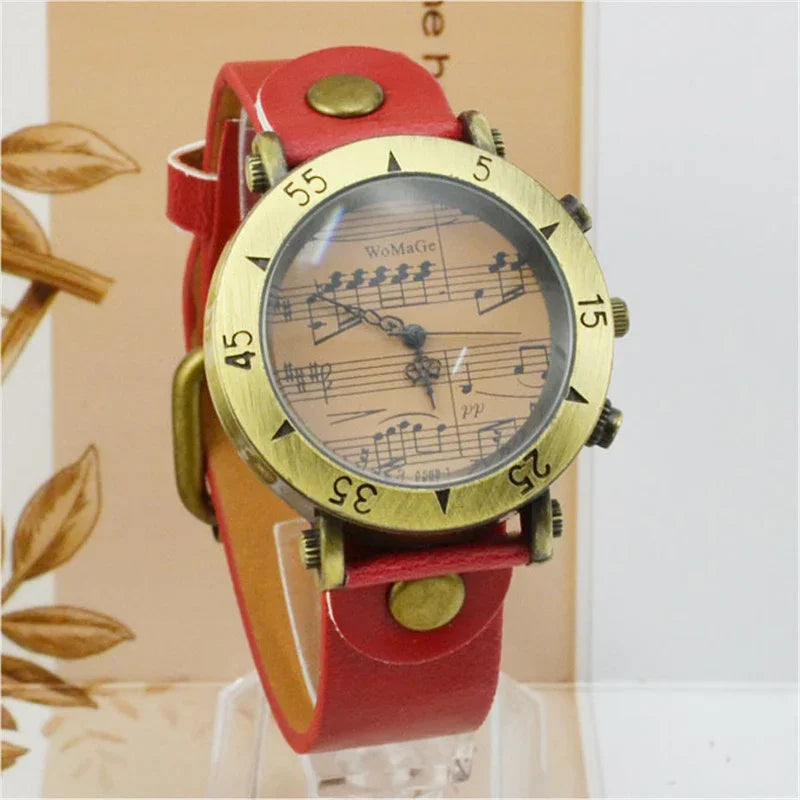 Vintage style wristwatch with red leather strap and music note design on dial