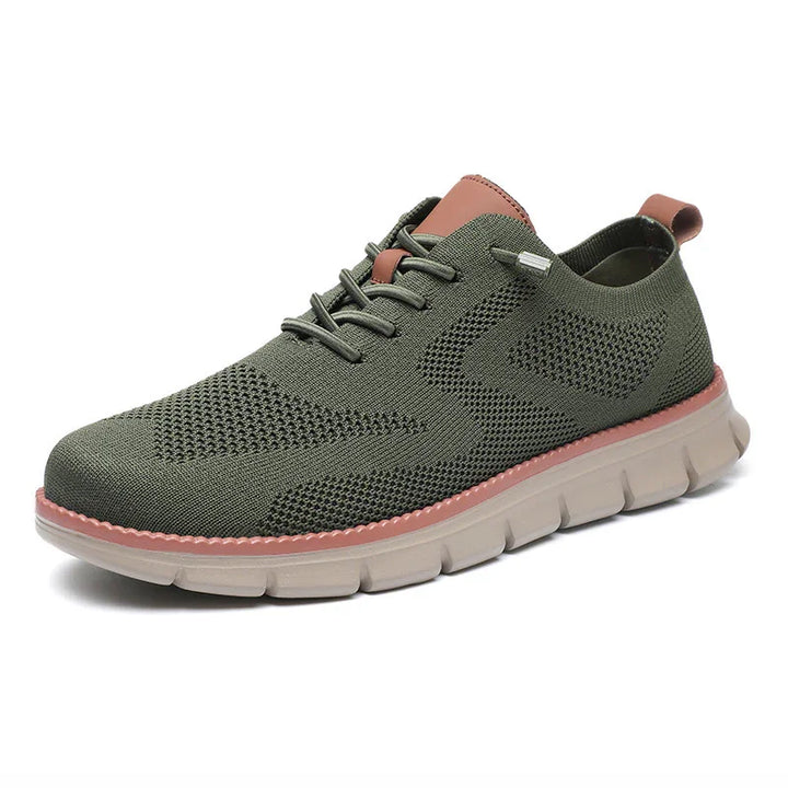 Green knitted casual sneaker with beige sole and pink accents, lace-up design