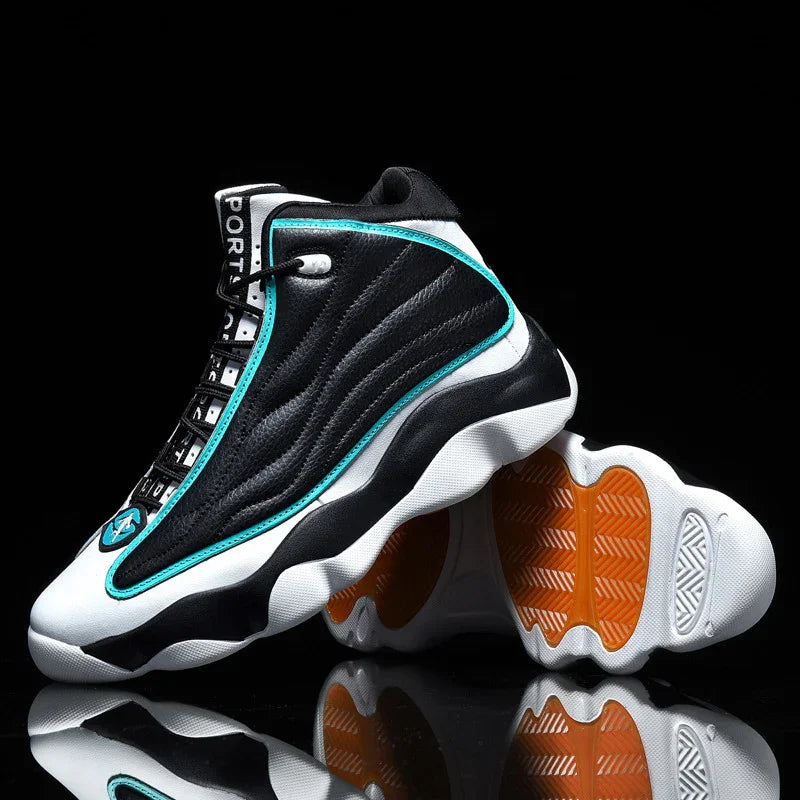 Black and white high-top basketball sneakers with turquoise accents and orange soles on reflective surface